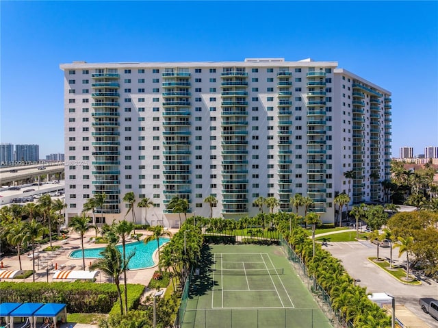 19380 Collins Ave Unit 317, Sunny Isles Beach, FL 33160 - view of building exterior with a community pool and a view of city