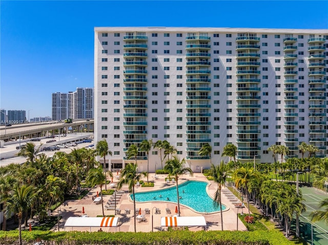 19380 Collins Ave Unit 317, Sunny Isles Beach, FL 33160 - community pool with a patio area and a city view