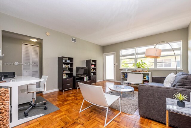 350 S Shore Dr Unit 7, Miami Beach, FL 33141 - living area featuring a desk and baseboards
