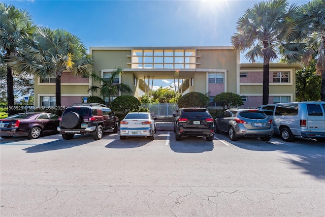350 S Shore Dr Unit 7, Miami Beach, FL 33141 - view of building exterior featuring uncovered parking