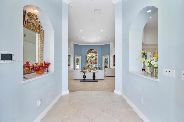 15960 SW 250th St, Homestead, FL 33031 - hall featuring ornamental molding, tile patterned flooring, arched walkways, baseboards, and recessed lighting