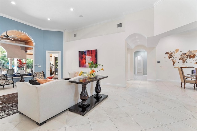 15960 SW 250th St, Homestead, FL 33031 - living room with a towering ceiling, arched walkways, crown molding, ceiling fan, and recessed lighting