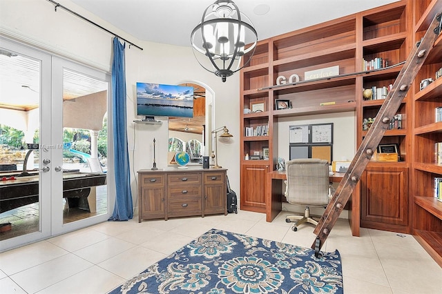 15960 SW 250th St, Homestead, FL 33031 - office space with light tile patterned floors, a chandelier, french doors, and built in desk