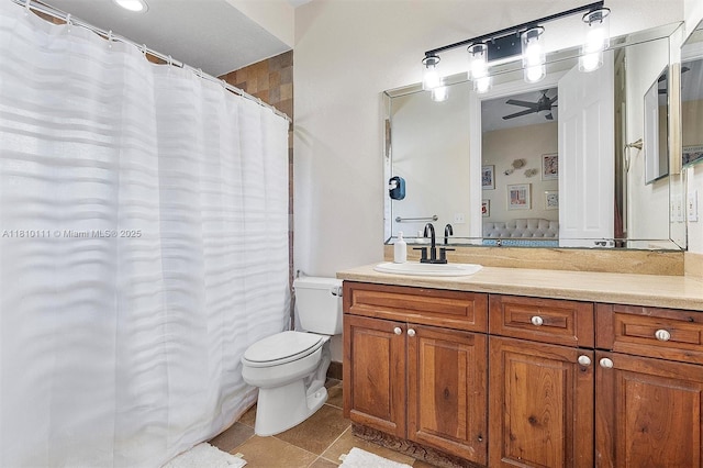15960 SW 250th St, Homestead, FL 33031 - full bath with toilet, vanity, ceiling fan, tile patterned flooring, and curtained shower