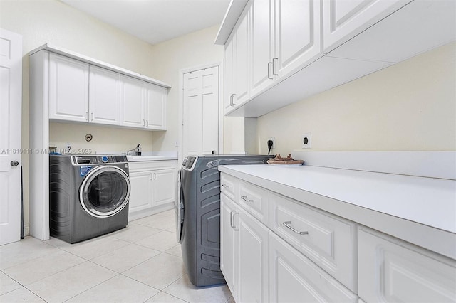 15960 SW 250th St, Homestead, FL 33031 - laundry area featuring cabinet space, light tile patterned floors, and washer and dryer