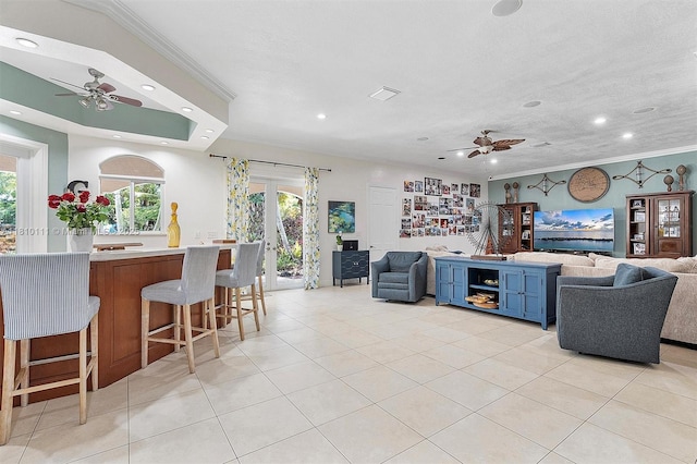 15960 SW 250th St, Homestead, FL 33031 - living area featuring ceiling fan, healthy amount of natural light, ornamental molding, light tile patterned floors, and recessed lighting