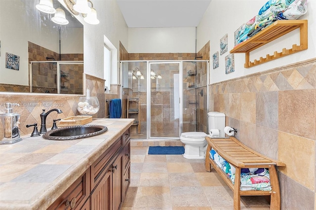 15960 SW 250th St, Homestead, FL 33031 - full bathroom with tile walls, vanity, toilet, and a stall shower