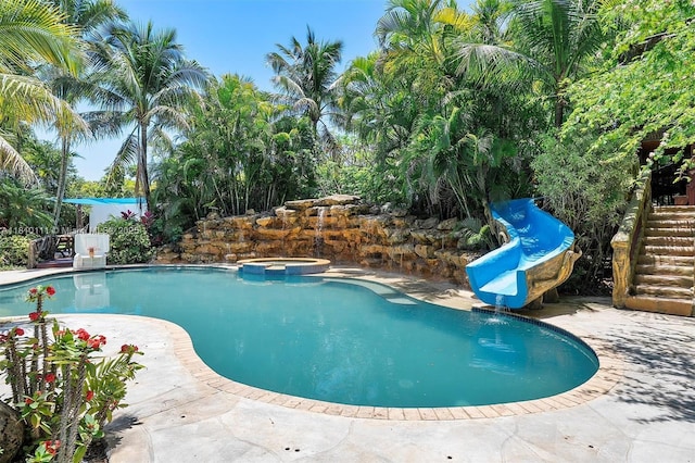 15960 SW 250th St, Homestead, FL 33031 - view of pool with a water slide and a pool with connected hot tub