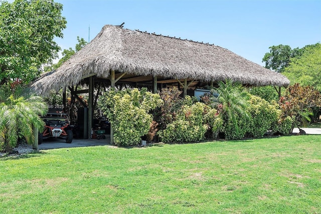 15960 SW 250th St, Homestead, FL 33031 - view of green lawn with a gazebo and a carport