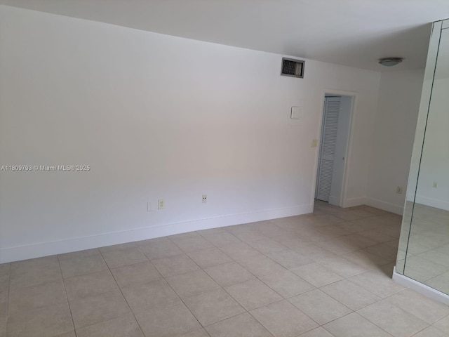 1975 NE 135th St Unit 2D, North Miami, FL 33181 - unfurnished room featuring baseboards