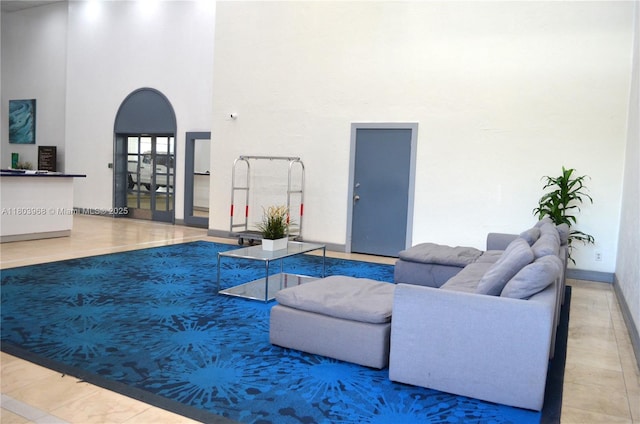 13499 Biscayne Blvd Unit 702, North Miami, FL 33181 - living room featuring a towering ceiling