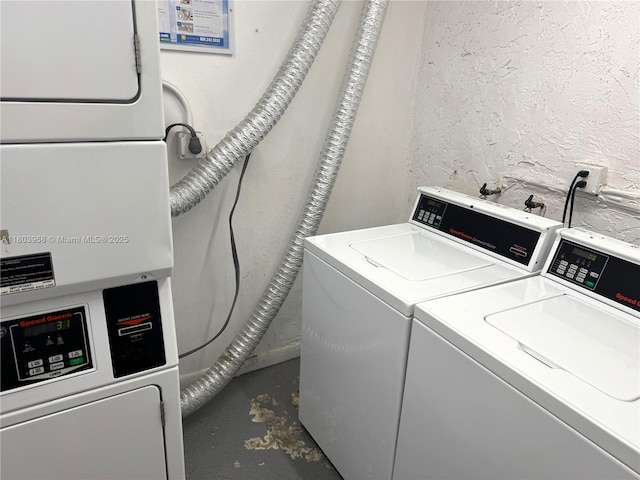 13499 Biscayne Blvd Unit 702, North Miami, FL 33181 - washroom with washer and clothes dryer, a textured wall, and heating unit