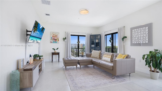 8301 NW 41st St Unit B-404, Doral, FL 33166 - living area with light tile patterned floors and baseboards