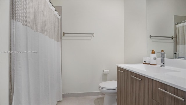 8301 NW 41st St Unit B-404, Doral, FL 33166 - bathroom featuring vanity, tile patterned floors, toilet, and baseboards