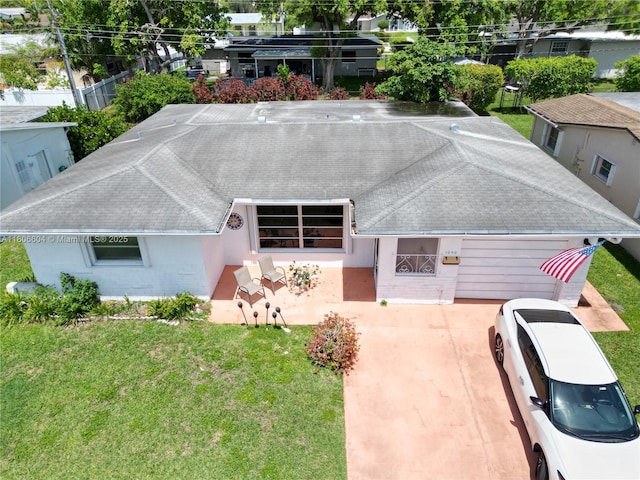 1090 NW 66th Ter, Margate, FL 33063 - view of front of property with a shingled roof and a front yard