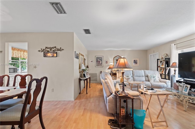 1090 NW 66th Ter, Margate, FL 33063 - living room featuring light wood finished floors and baseboards