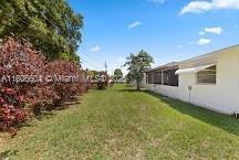 1090 NW 66th Ter, Margate, FL 33063 - view of grassy yard