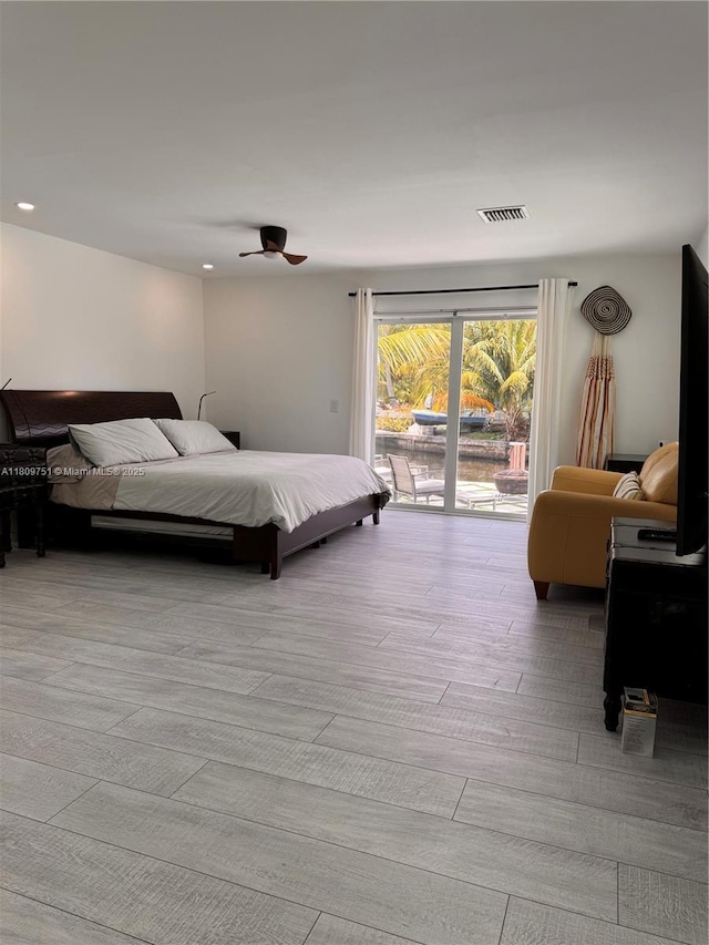501 SW 18th St, Pompano Beach, FL 33060 - bedroom featuring access to exterior, wood finished floors, recessed lighting, and a ceiling fan