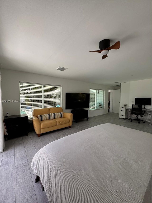 501 SW 18th St, Pompano Beach, FL 33060 - bedroom with a desk and a ceiling fan