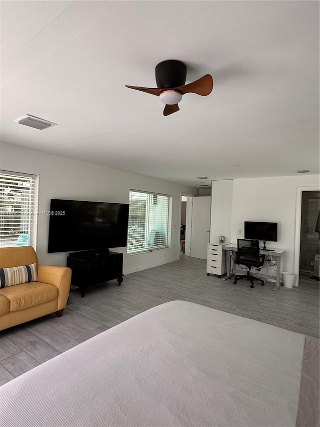 501 SW 18th St, Pompano Beach, FL 33060 - living room featuring a desk, ceiling fan, and wood finished floors