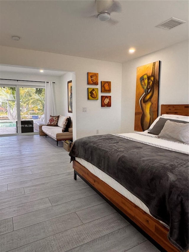 501 SW 18th St, Pompano Beach, FL 33060 - bedroom with wood finished floors, access to outside, and recessed lighting