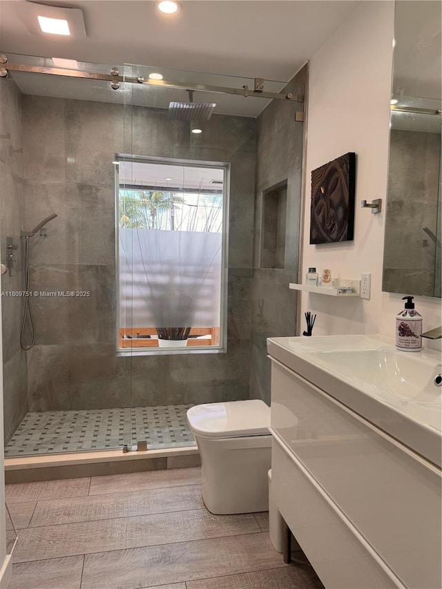 501 SW 18th St, Pompano Beach, FL 33060 - full bath with vanity, a shower stall, and toilet