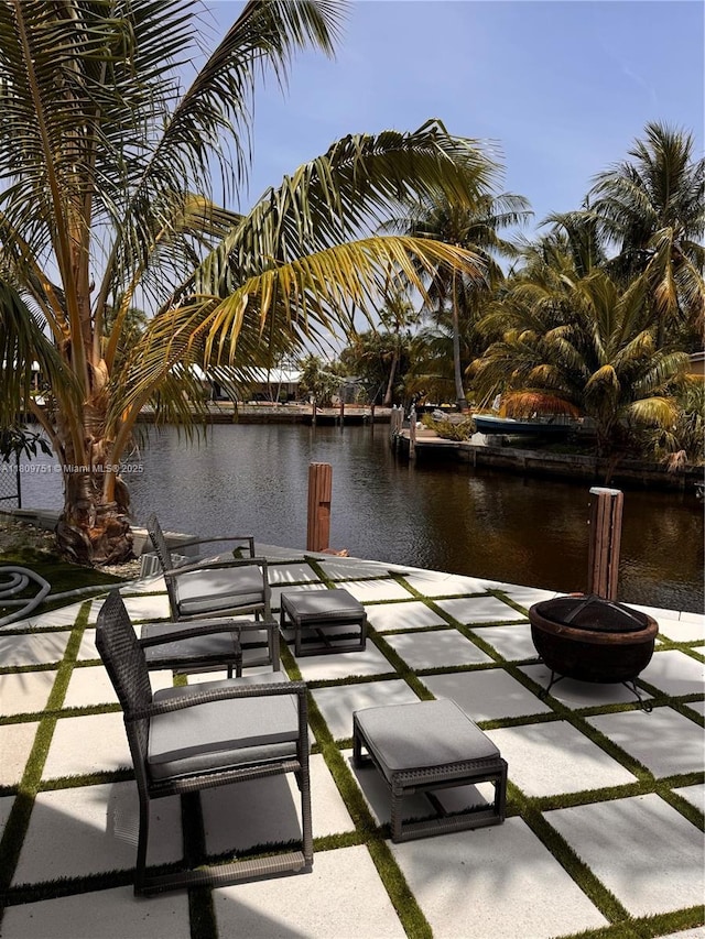 501 SW 18th St, Pompano Beach, FL 33060 - dock area with a fire pit, a water view, and a patio