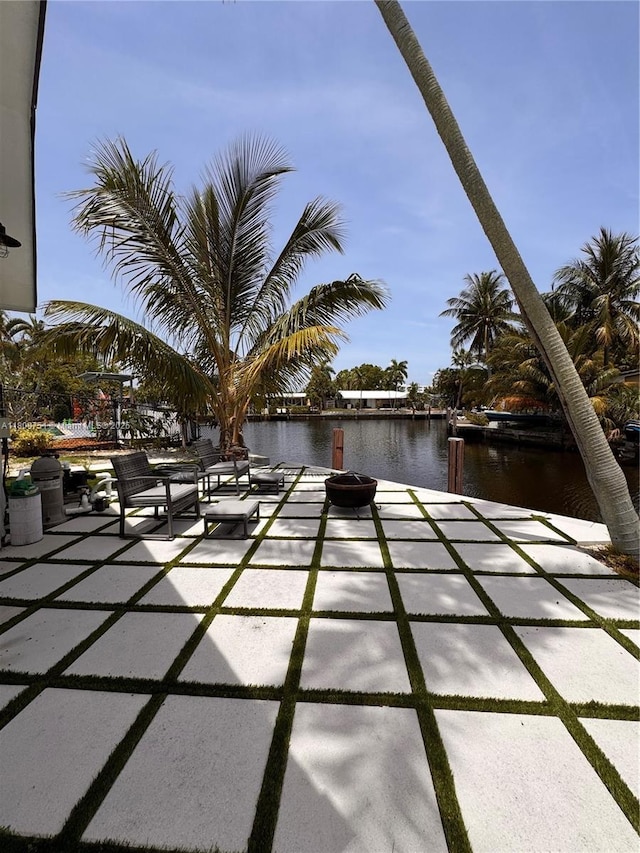 501 SW 18th St, Pompano Beach, FL 33060 - view of patio / terrace featuring a water view and a dock