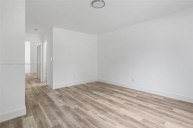 7572 NW 3rd St, Plantation, FL 33317 - unfurnished room with light wood finished floors and baseboards