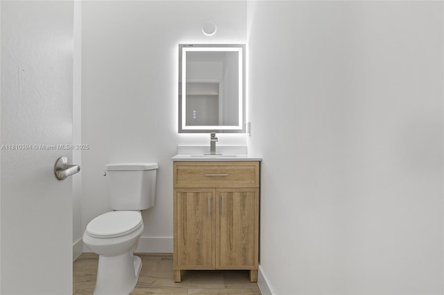 7572 NW 3rd St, Plantation, FL 33317 - bathroom featuring toilet, vanity, and baseboards