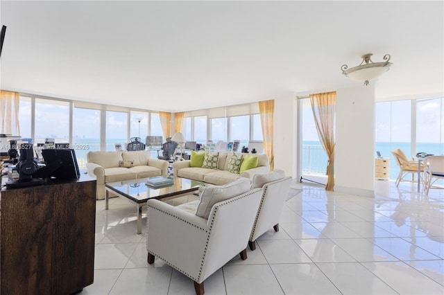 881 Ocean Dr Unit 13H, Key Biscayne, FL 33149 - living room with expansive windows, light tile patterned floors, and a water view