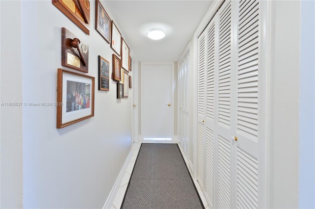 881 Ocean Dr Unit 13H, Key Biscayne, FL 33149 - bathroom featuring vanity, a marble finish shower, and tile patterned floors