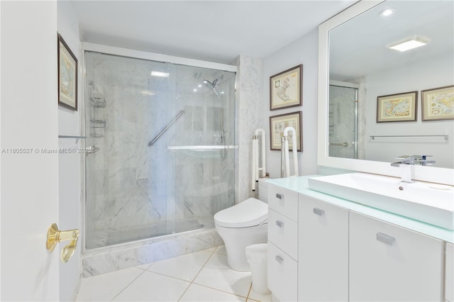 881 Ocean Dr Unit 13H, Key Biscayne, FL 33149 - bathroom featuring vanity, a marble finish shower, and tile patterned floors