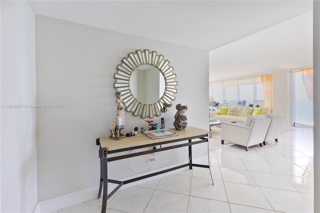881 Ocean Dr Unit 13H, Key Biscayne, FL 33149 - corridor featuring light tile patterned floors and baseboards