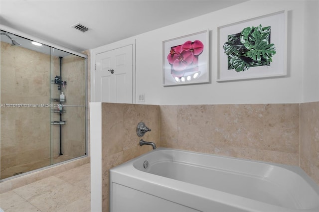 3232 SW 22nd Ter Unit 1106, Miami, FL 33145 - bathroom featuring a garden tub and a shower stall