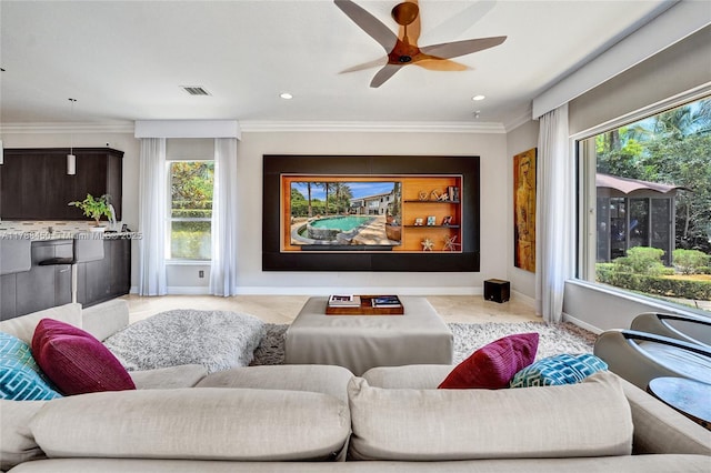 11356 Canyon Maple Blvd, Davie, FL 33330 - living room with baseboards, ceiling fan, plenty of natural light, ornamental molding, and recessed lighting