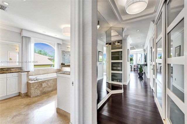 11356 Canyon Maple Blvd, Davie, FL 33330 - corridor featuring plenty of natural light and crown molding