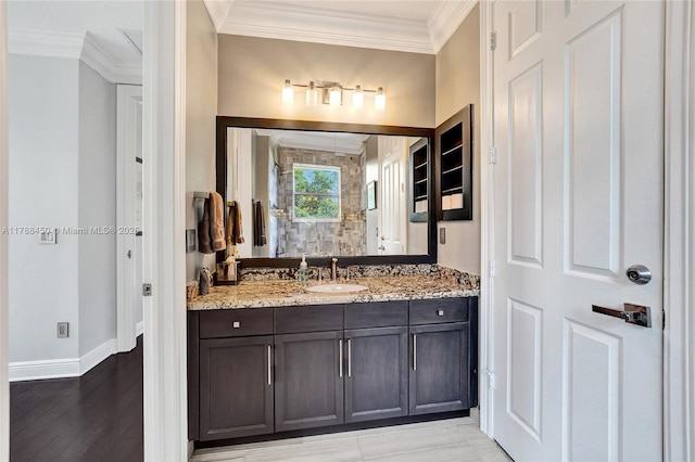 11356 Canyon Maple Blvd, Davie, FL 33330 - full bathroom featuring vanity, ornamental molding, wood finished floors, and baseboards