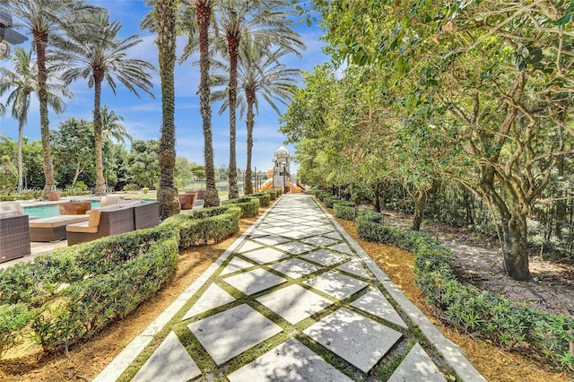 11356 Canyon Maple Blvd, Davie, FL 33330 - view of community with outdoor lounge area and a pool