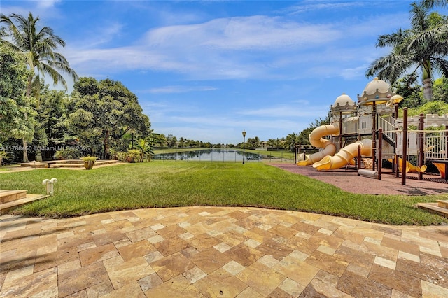 11356 Canyon Maple Blvd, Davie, FL 33330 - view of green lawn featuring a water view