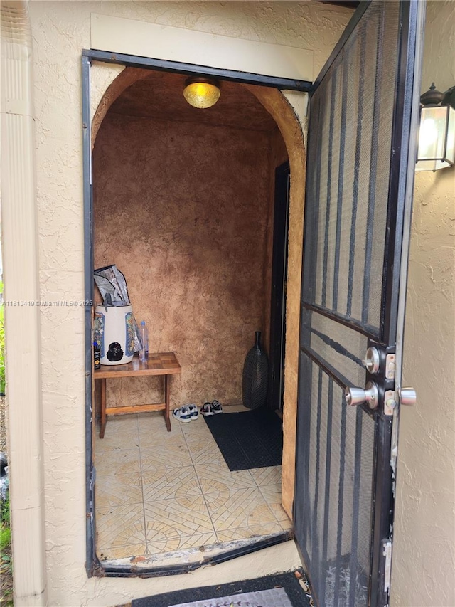 22374 SW 57th Cir, Boca Raton, FL 33428 - property entrance featuring stucco siding