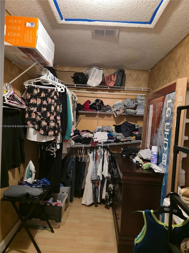 22374 SW 57th Cir, Boca Raton, FL 33428 - walk in closet with wood finished floors