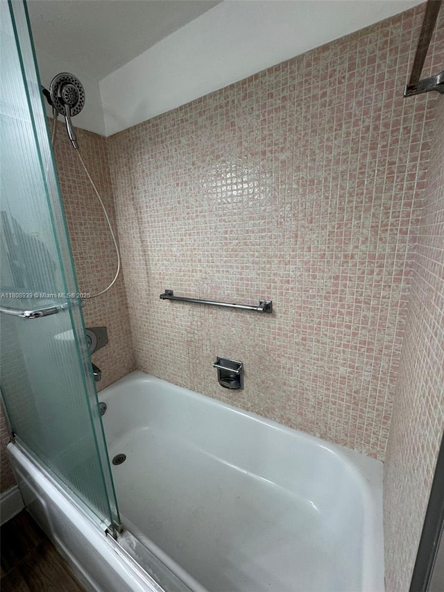 218 Windsor J Unit 218, West Palm Beach, FL 33417 - bathroom with bath / shower combo with glass door and wood finished floors