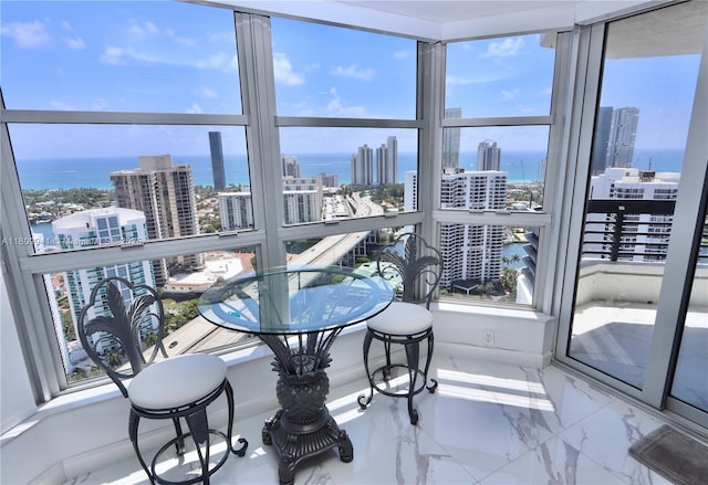 3500 Mystic Pointe Dr Unit 3906, Aventura, FL 33180 - sunroom / solarium with a view of city, a water view, and healthy amount of natural light