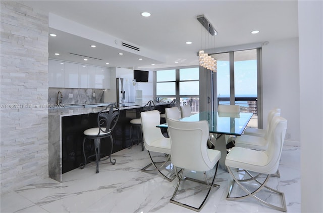 3500 Mystic Pointe Dr Unit 3906, Aventura, FL 33180 - dining area featuring recessed lighting and light marble finish floors