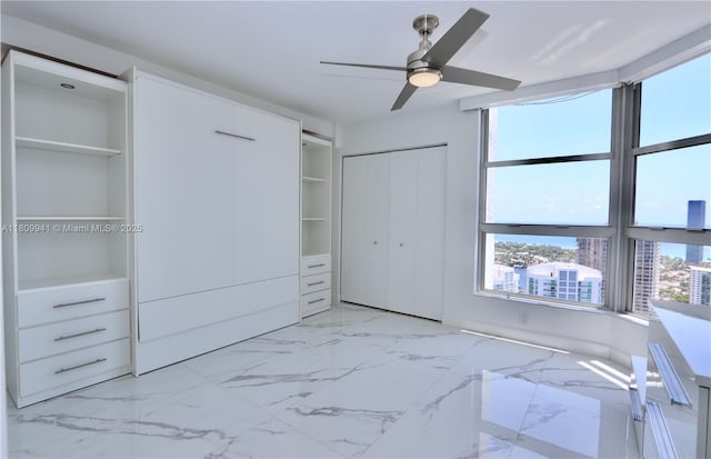3500 Mystic Pointe Dr Unit 3906, Aventura, FL 33180 - bedroom featuring light marble finish flooring and ceiling fan