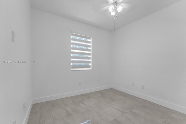9285 SW 220th Ter, Cutler Bay, FL 33190 - empty room with ceiling fan and baseboards