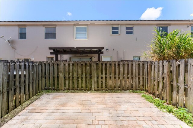 9285 SW 220th Ter, Cutler Bay, FL 33190 - fenced backyard with a patio and a pergola