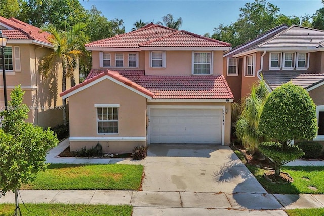 15141 SW 46th St, Miramar, FL 33027 - mediterranean / spanish home with a tile roof, stucco siding, driveway, and a garage