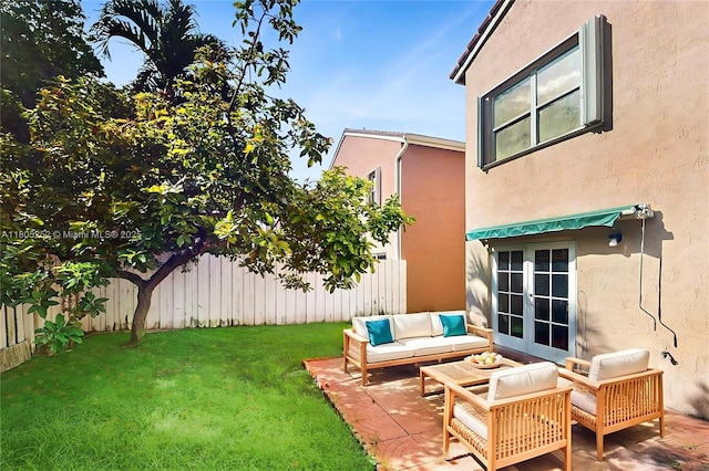 15141 SW 46th St, Miramar, FL 33027 - fenced yard with french doors, a patio area, and outdoor lounge area
